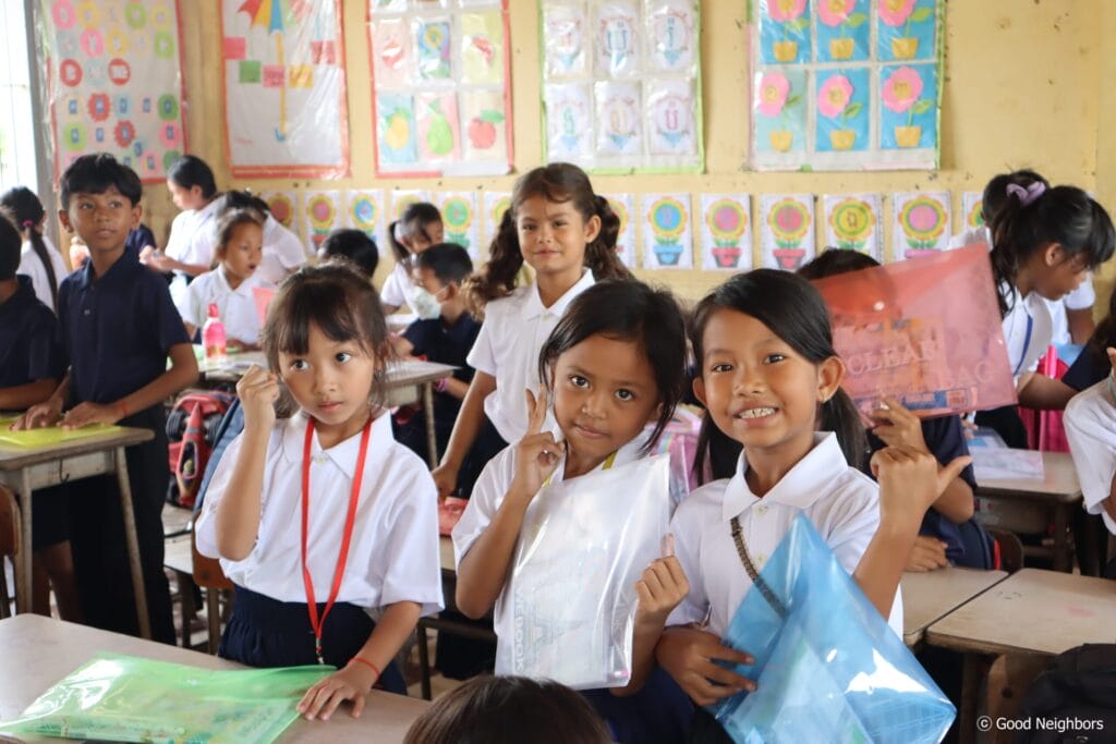 Good Neighbors Cambodia – Cam Capital Plc Supported Tuol Rokakos Primary School with School Supplies and T-Shirts 6 4. Students 1 scaled 1