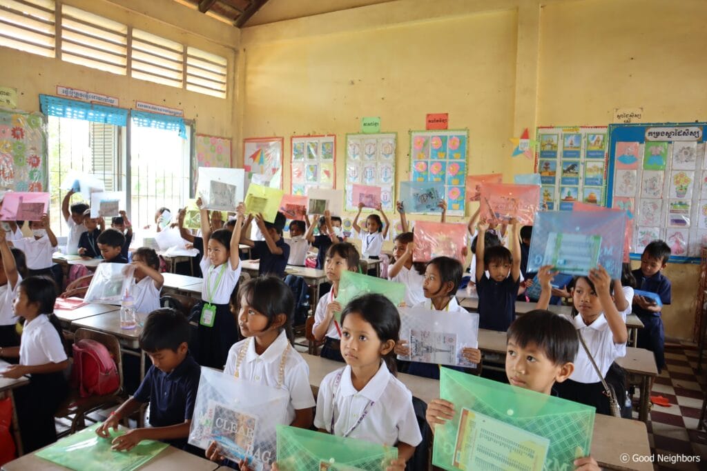 Good Neighbors Cambodia – Cam Capital Plc Supported Tuol Rokakos Primary School with School Supplies and T-Shirts 5 4. Students 5 scaled 1